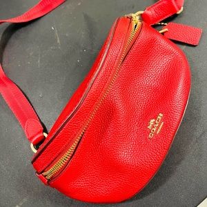 Polished pebble leather,zip closure , outside pocket.